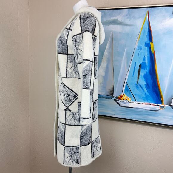 Baciano sweater coat
Long, hooded Size small - Picture 3 of 6